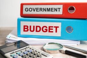 government-budget-binder-data-finance-report-business-with-graph-analysis-in-office-photo