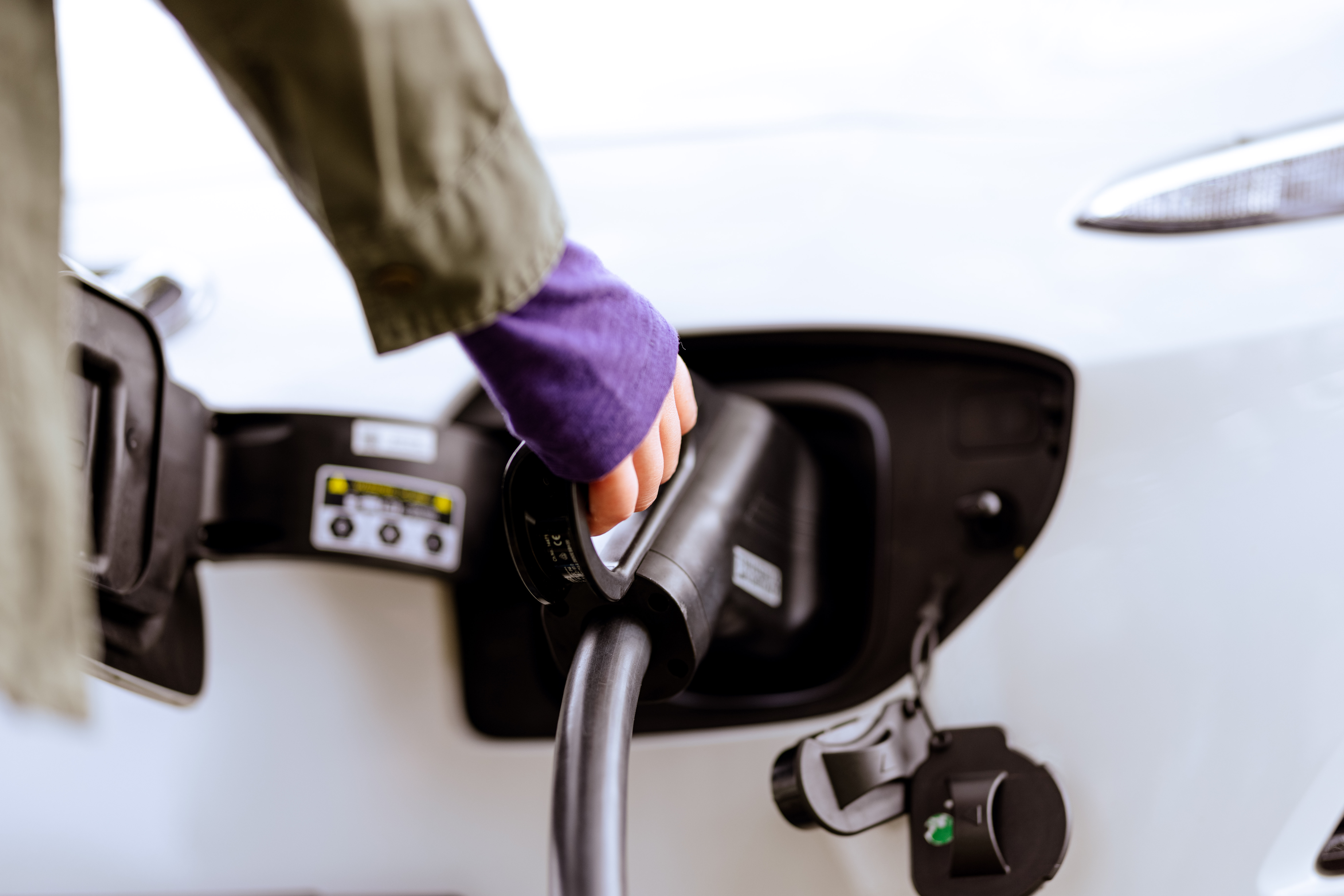 holding-the-ev-charger-plug-1