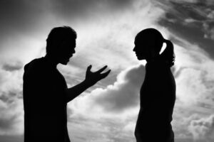 Upset couple fighting arguing with each other