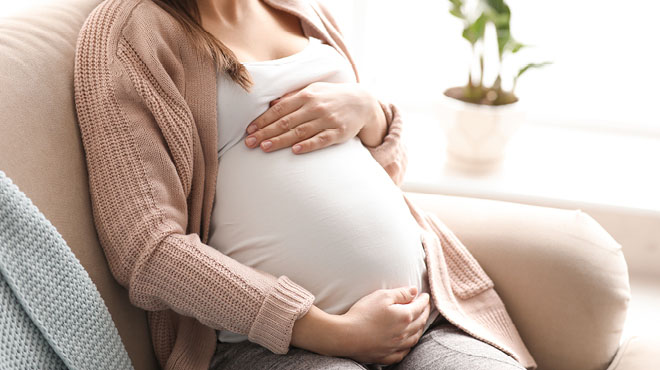 pregnant-woman-holding-baby-bump