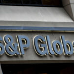 FILE PHOTO: The S&P Global logo is displayed on its offices in the financial district in New York City
