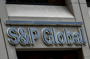 FILE PHOTO: The S&P Global logo is displayed on its offices in the financial district in New York City