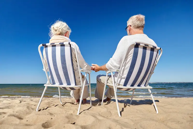 senior-couple-sitting-chairs-summer-beach-family-old-age-travel-tourism-people-concept-happy-deck-80602456