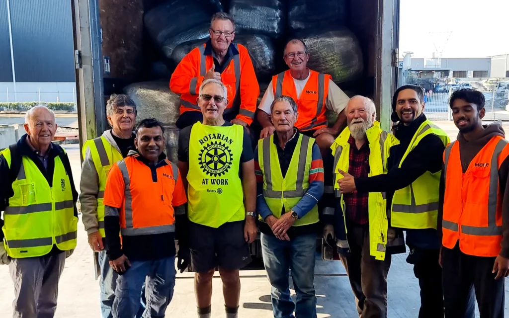 4JJNBYH_Rotary_club_members_with_the_shelter_bags_jpg