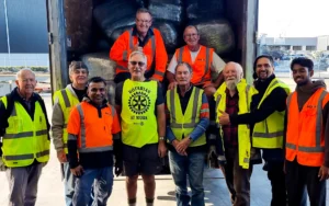 4JJNBYH_Rotary_club_members_with_the_shelter_bags_jpg